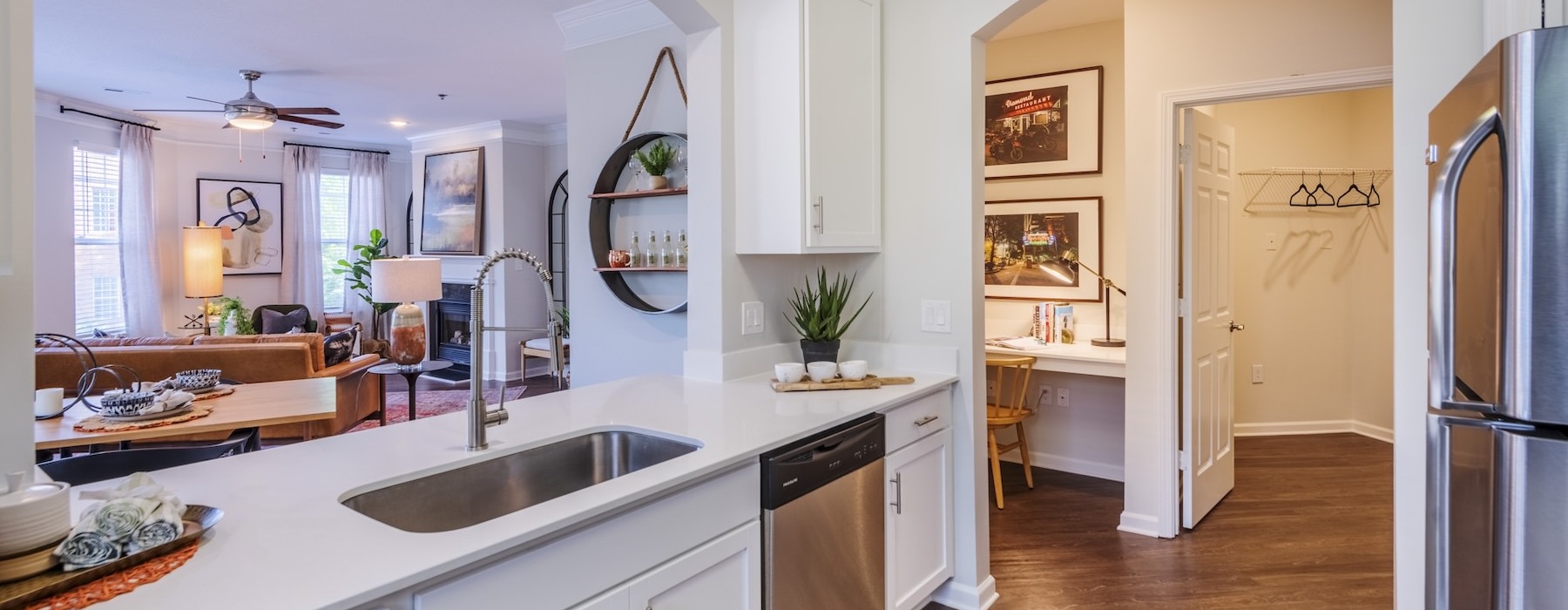 a kitchen with white cabinets
