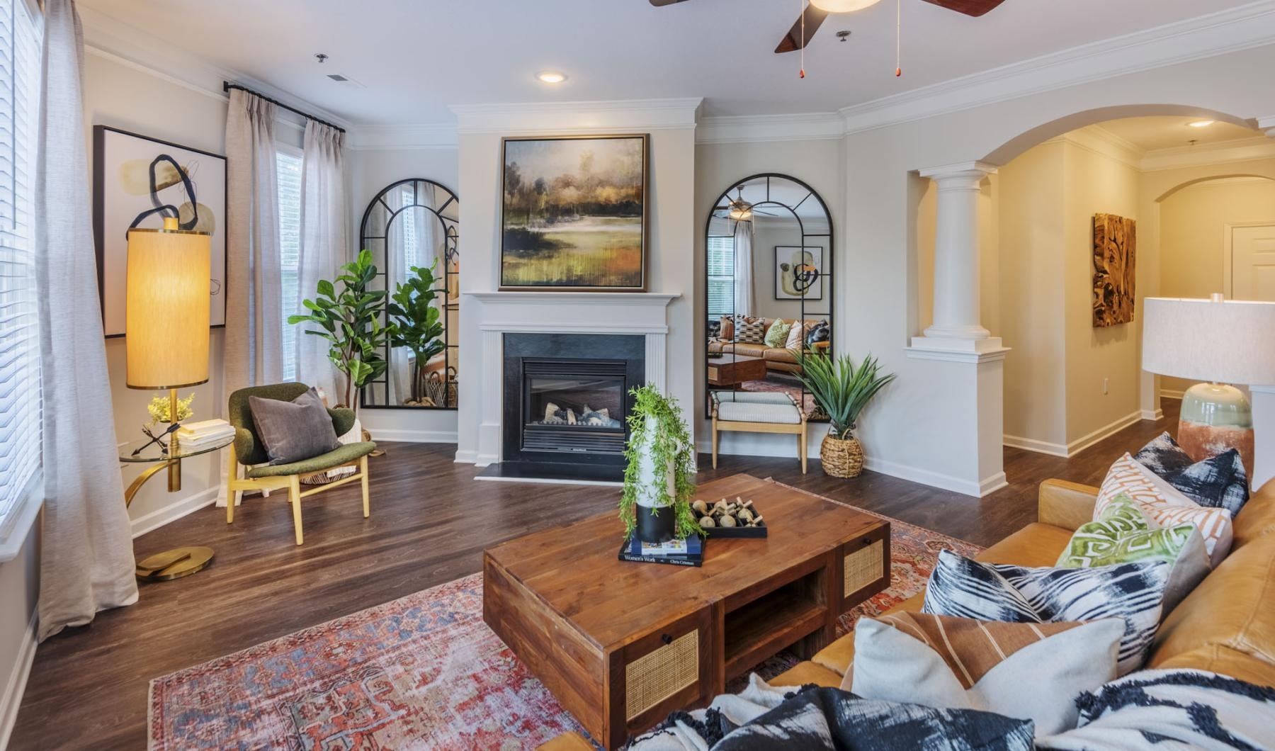 a living room with a fireplace and a couch